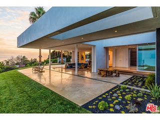 20659 Rockcroft Drive Malibu, CA 90265 - Photo 6 of 33 a view of a backyard with swimming pool and patio