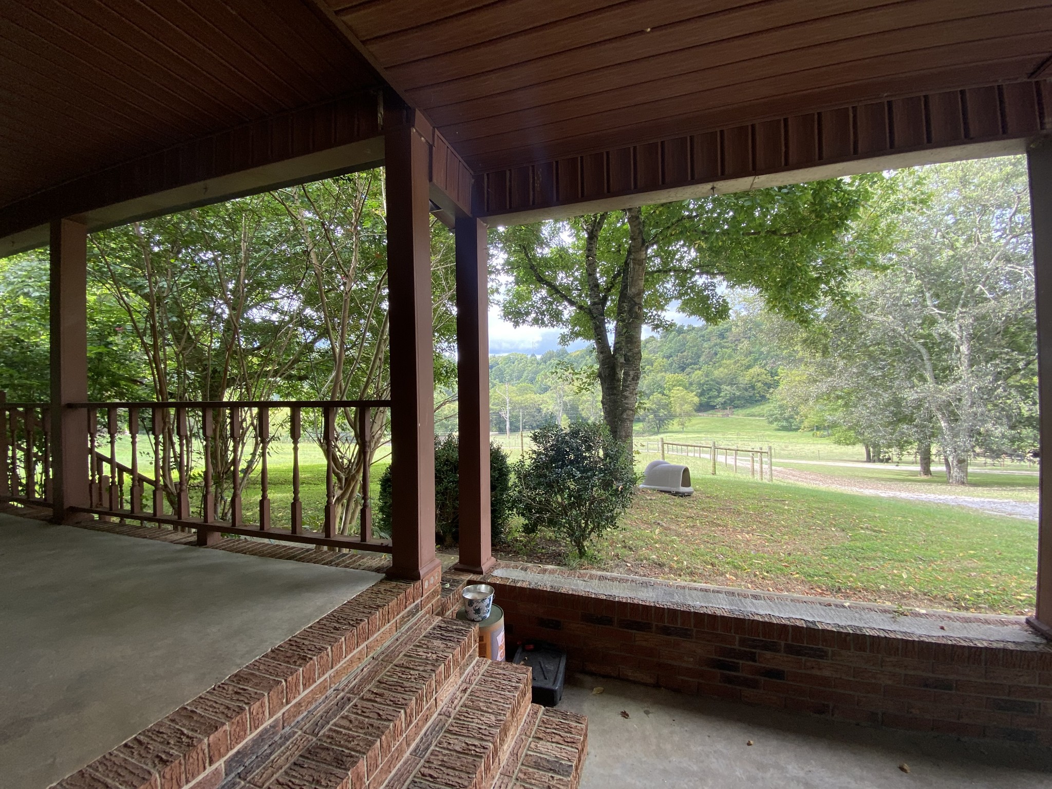201 Young Hollow Road Pulaski, TN 38478 - Photo 2 of 24 a view of a room with wooden floor and outdoor space