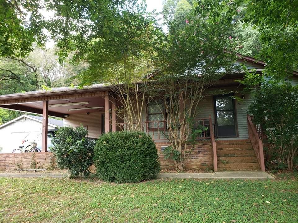 201 Young Hollow Road Pulaski, TN 38478 - Photo 3 of 24 a view of a house with a yard