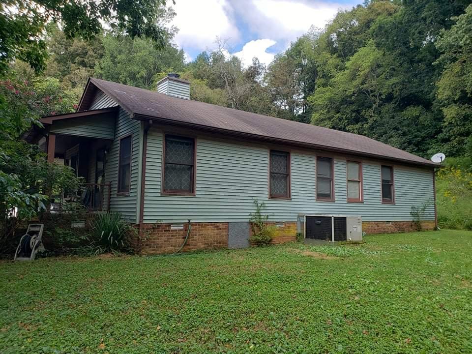201 Young Hollow Road Pulaski, TN 38478 - Photo 22 of 24 a view of a house with a yard