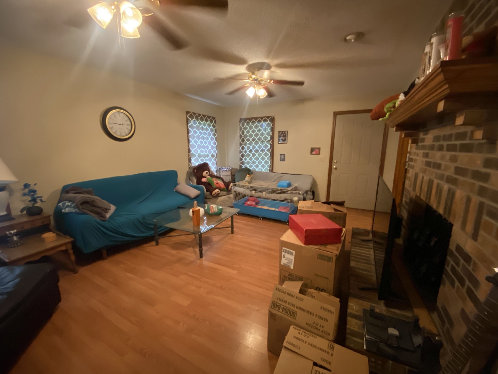 201 Young Hollow Road Pulaski, TN 38478 - Photo 6 of 24 a living room with furniture a rug and a fan