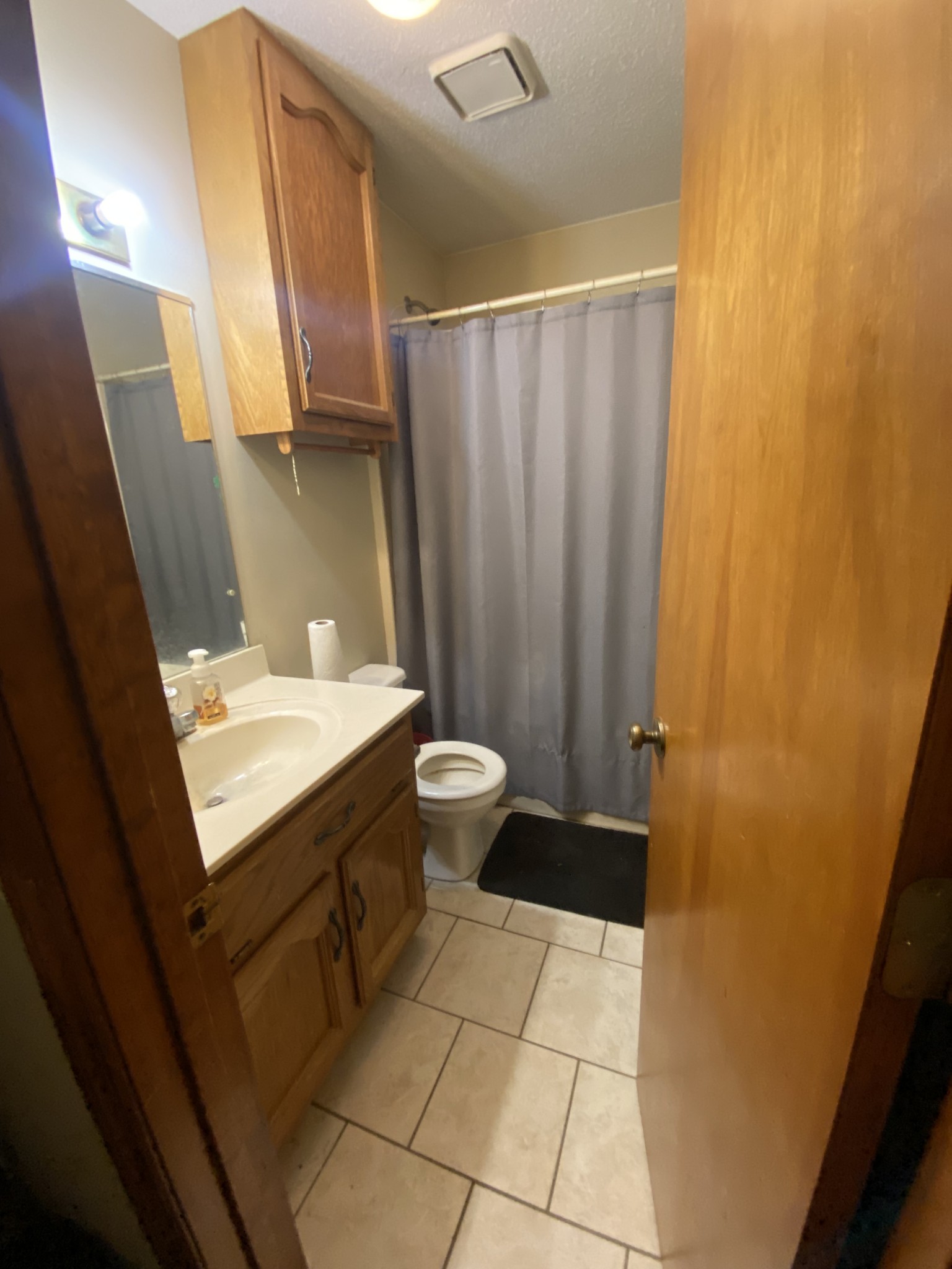201 Young Hollow Road Pulaski, TN 38478 - Photo 7 of 24 a bathroom with a sink a toilet and a mirror