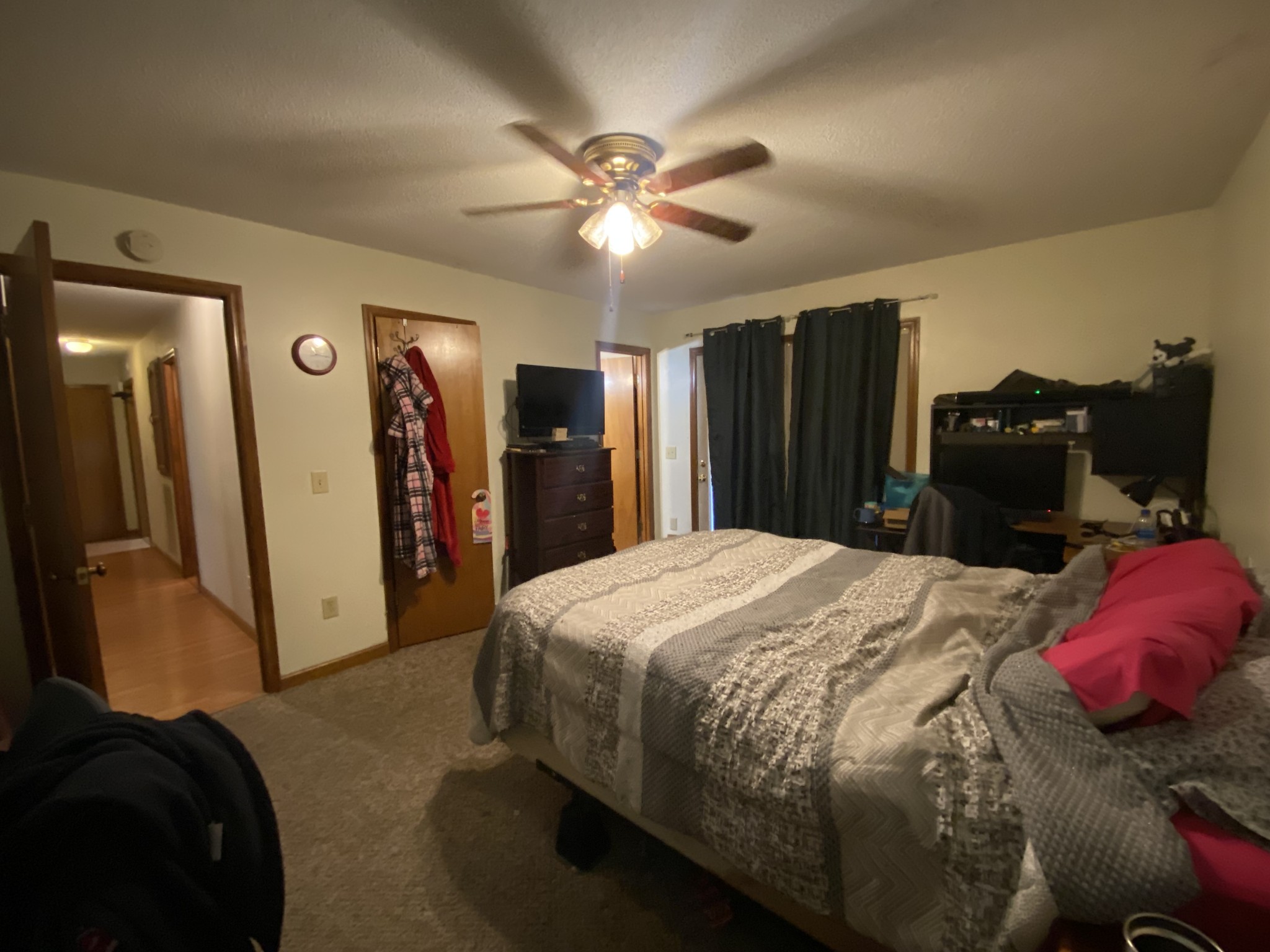 201 Young Hollow Road Pulaski, TN 38478 - Photo 8 of 24 a bedroom with a bed and a chandelier