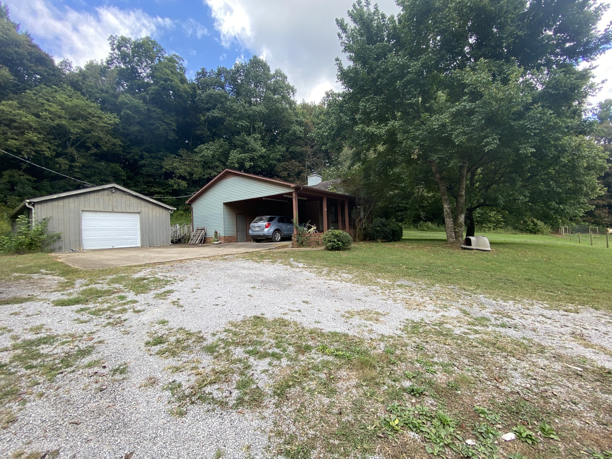 201 Young Hollow Road Pulaski, TN 38478 - Photo 10 of 24 a front view of a house with garden
