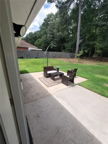 a view of a park with furniture