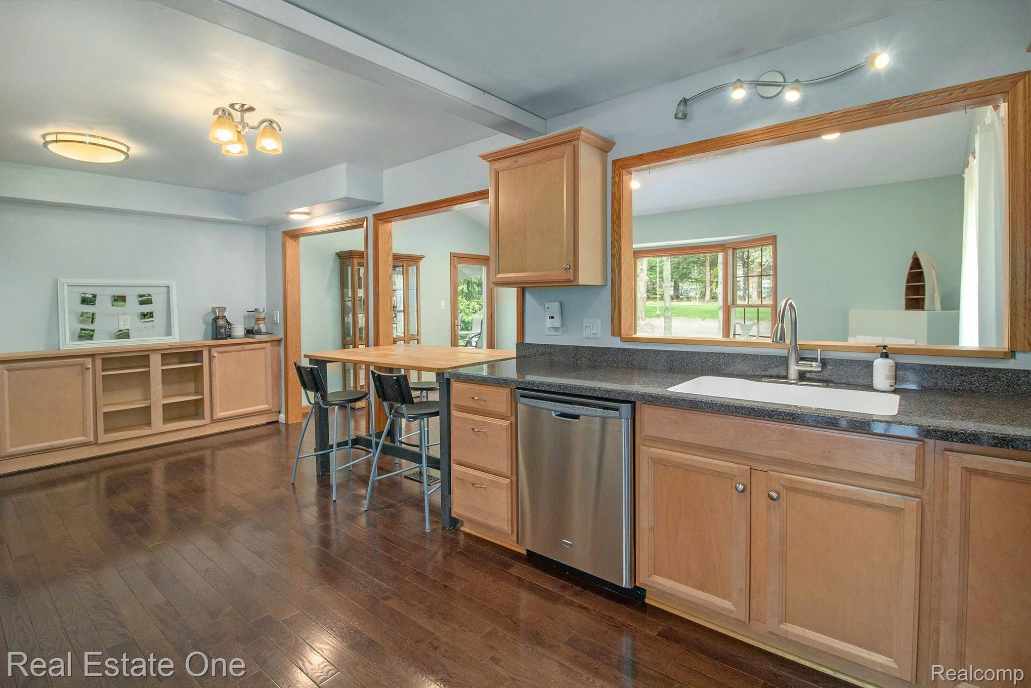 1296 Barneswood Lane Rochester, MI 48306 - Photo 6 of 32 Kitchen with plenty of counter space opens to the Family Room