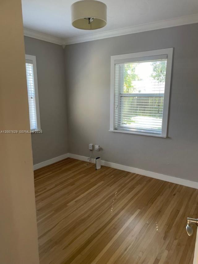 5886 Southwest 42nd Street Miami, FL 33155 - Photo 11 of 20 an empty room with a window