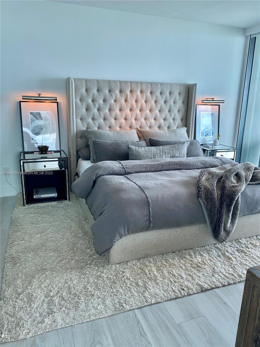 3131 Northeast 7th Avenue, Unit 2801 Miami, FL 33137 - Photo 12 of 47 a living room with a couch and a couch