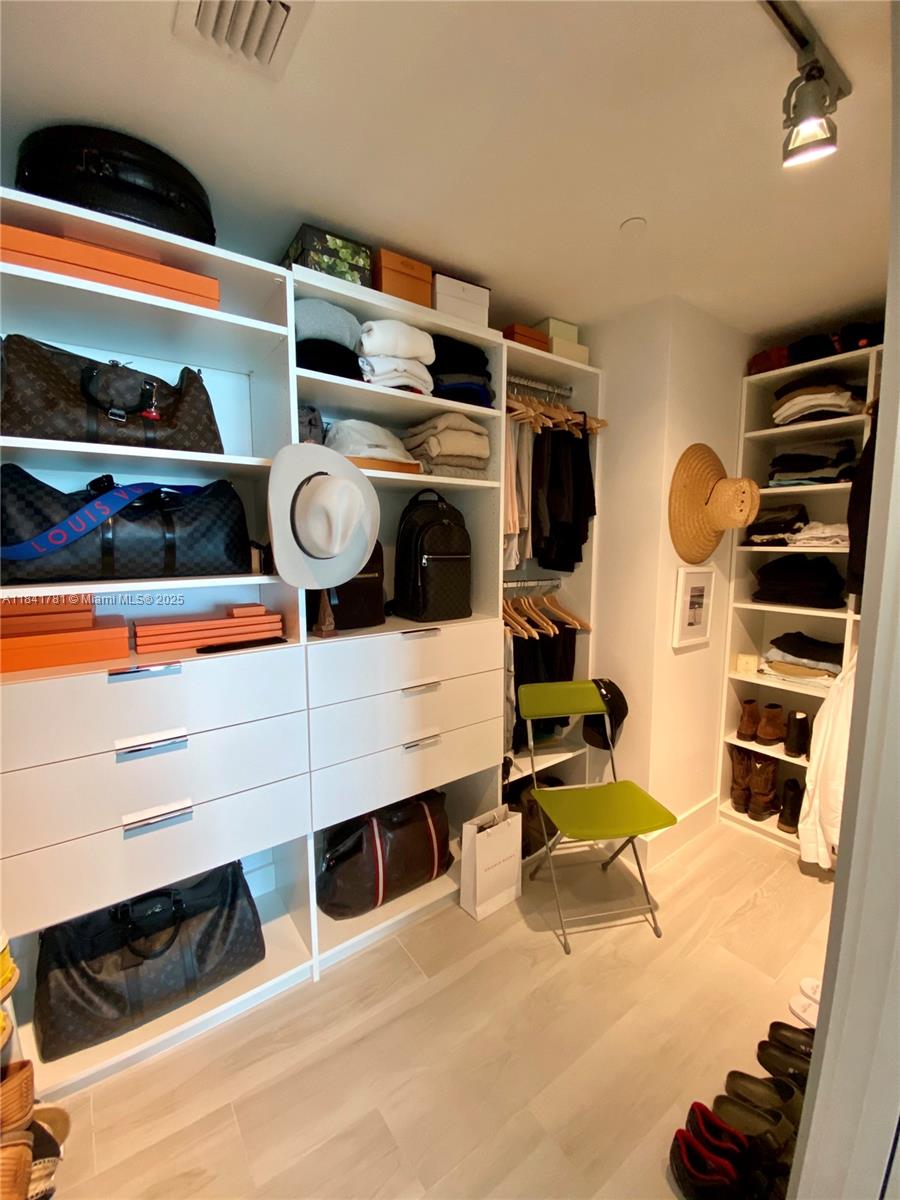 3131 Northeast 7th Avenue, Unit 2801 Miami, FL 33137 - Photo 15 of 47 a room with storage and utility