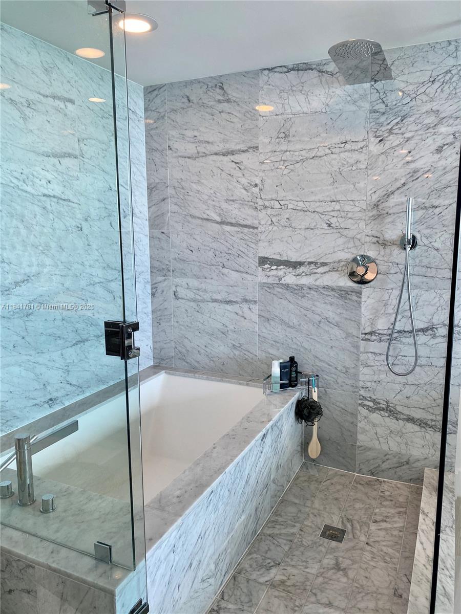 3131 Northeast 7th Avenue, Unit 2801 Miami, FL 33137 - Photo 18 of 47 a bathroom with a shower