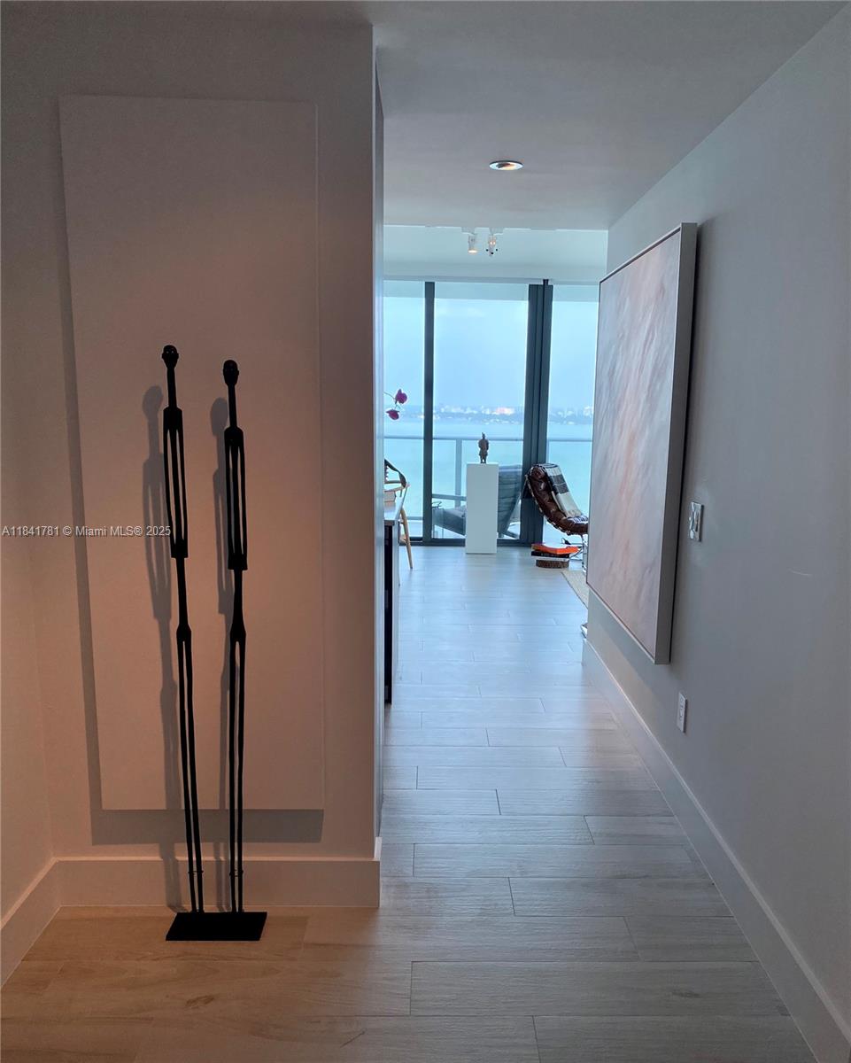 3131 Northeast 7th Avenue, Unit 2801 Miami, FL 33137 - Photo 19 of 47 a view of a livingroom with furniture and a window