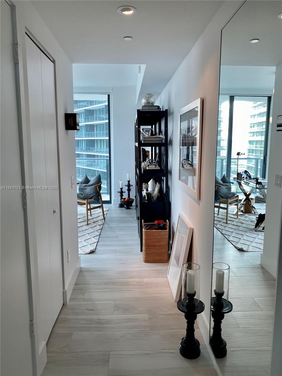 3131 Northeast 7th Avenue, Unit 2801 Miami, FL 33137 - Photo 24 of 47 a view of a livingroom with workspace and a window