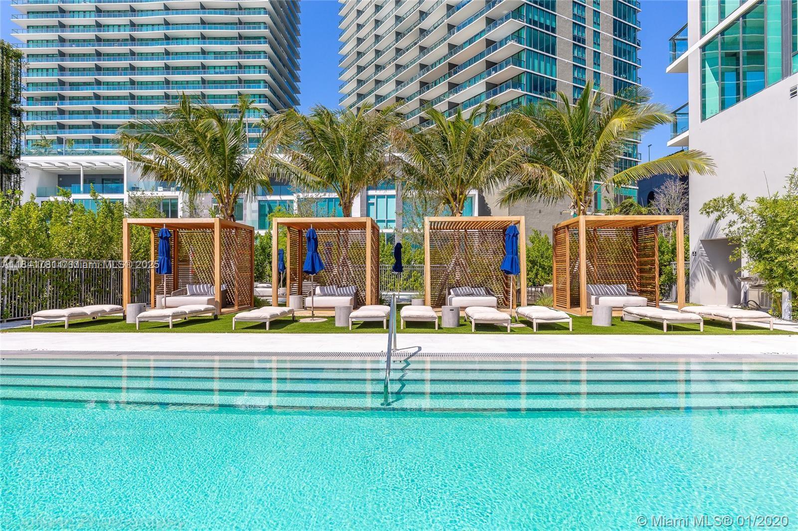 3131 Northeast 7th Avenue, Unit 2801 Miami, FL 33137 - Photo 32 of 47 a view of a house with a yard and sitting area