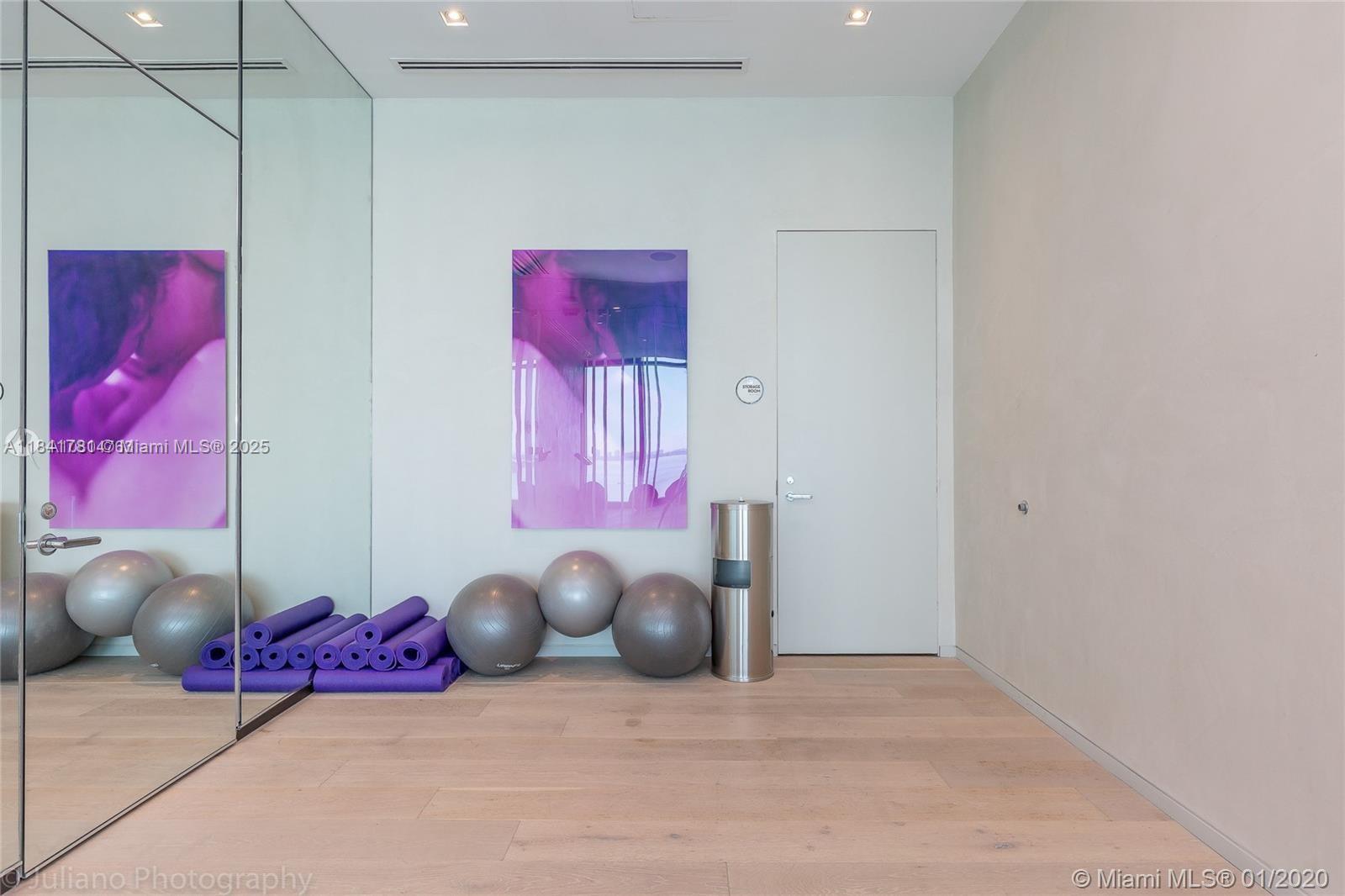 3131 Northeast 7th Avenue, Unit 2801 Miami, FL 33137 - Photo 35 of 47 a bedroom with furniture and a window