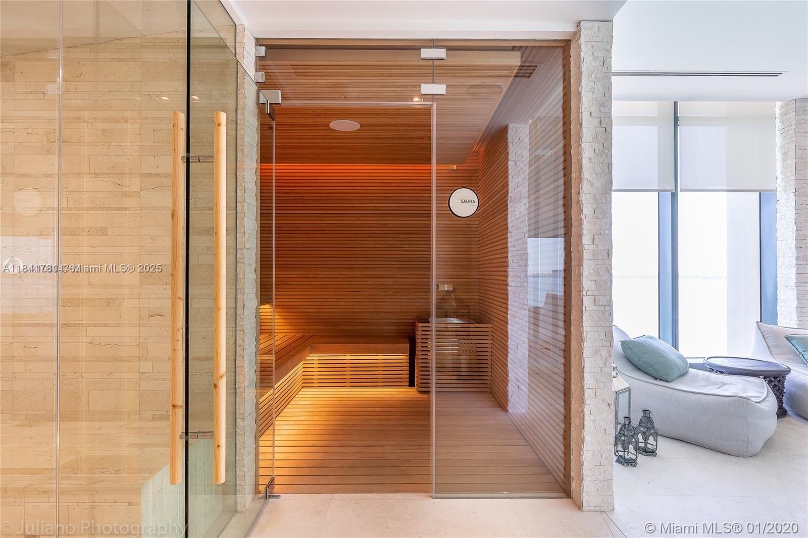 3131 Northeast 7th Avenue, Unit 2801 Miami, FL 33137 - Photo 37 of 47 a bathroom with a tub and shower