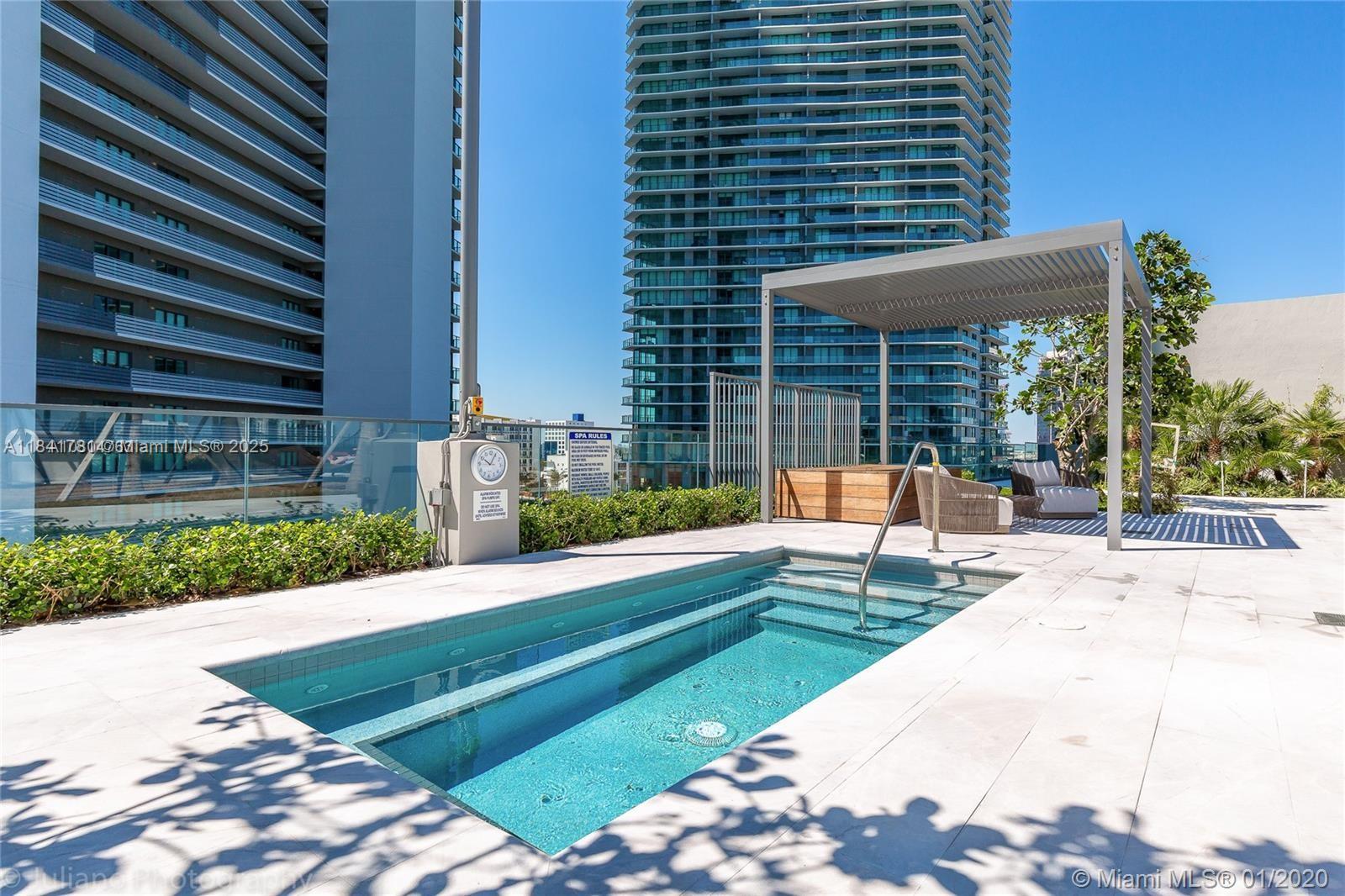 3131 Northeast 7th Avenue, Unit 2801 Miami, FL 33137 - Photo 39 of 47 a view of a house with backyard and sitting area
