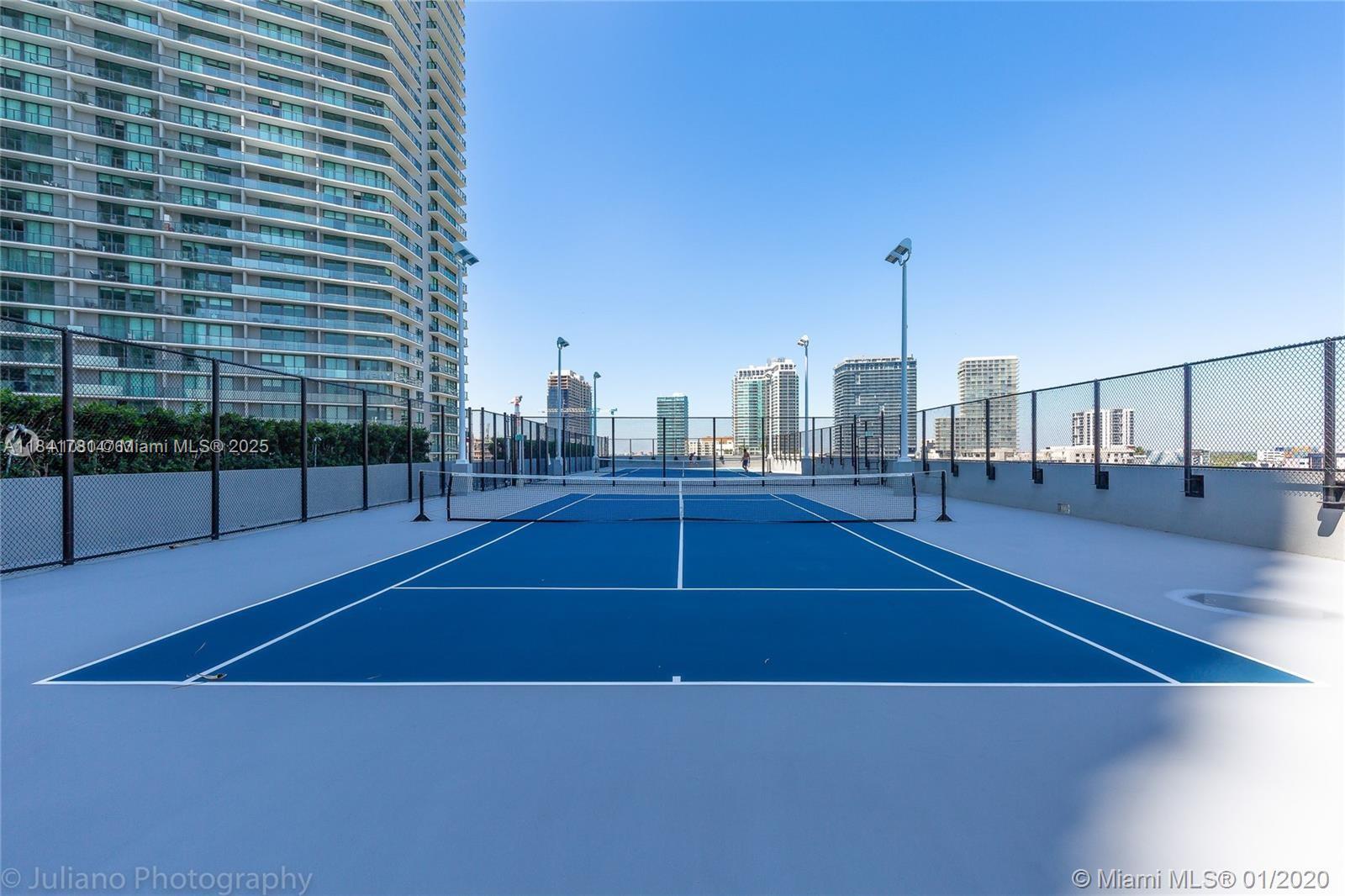 3131 Northeast 7th Avenue, Unit 2801 Miami, FL 33137 - Photo 40 of 47 a view of a tennis court