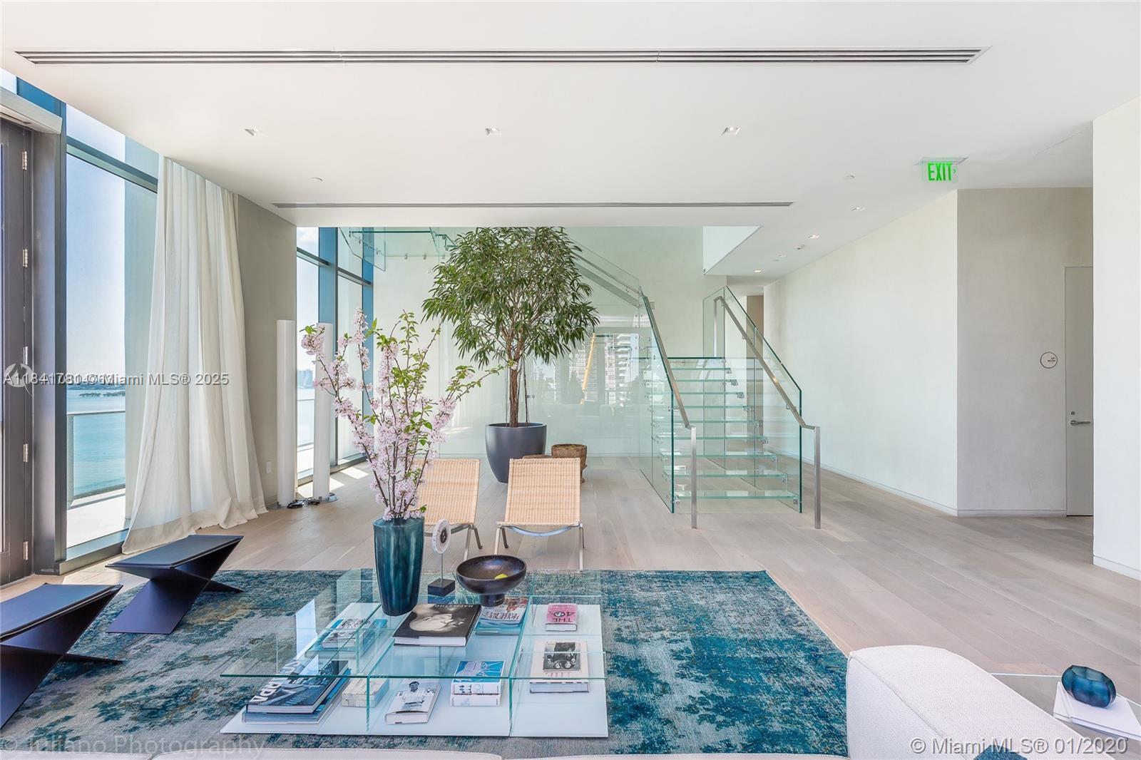 3131 Northeast 7th Avenue, Unit 2801 Miami, FL 33137 - Photo 43 of 47 a living room with furniture and a table