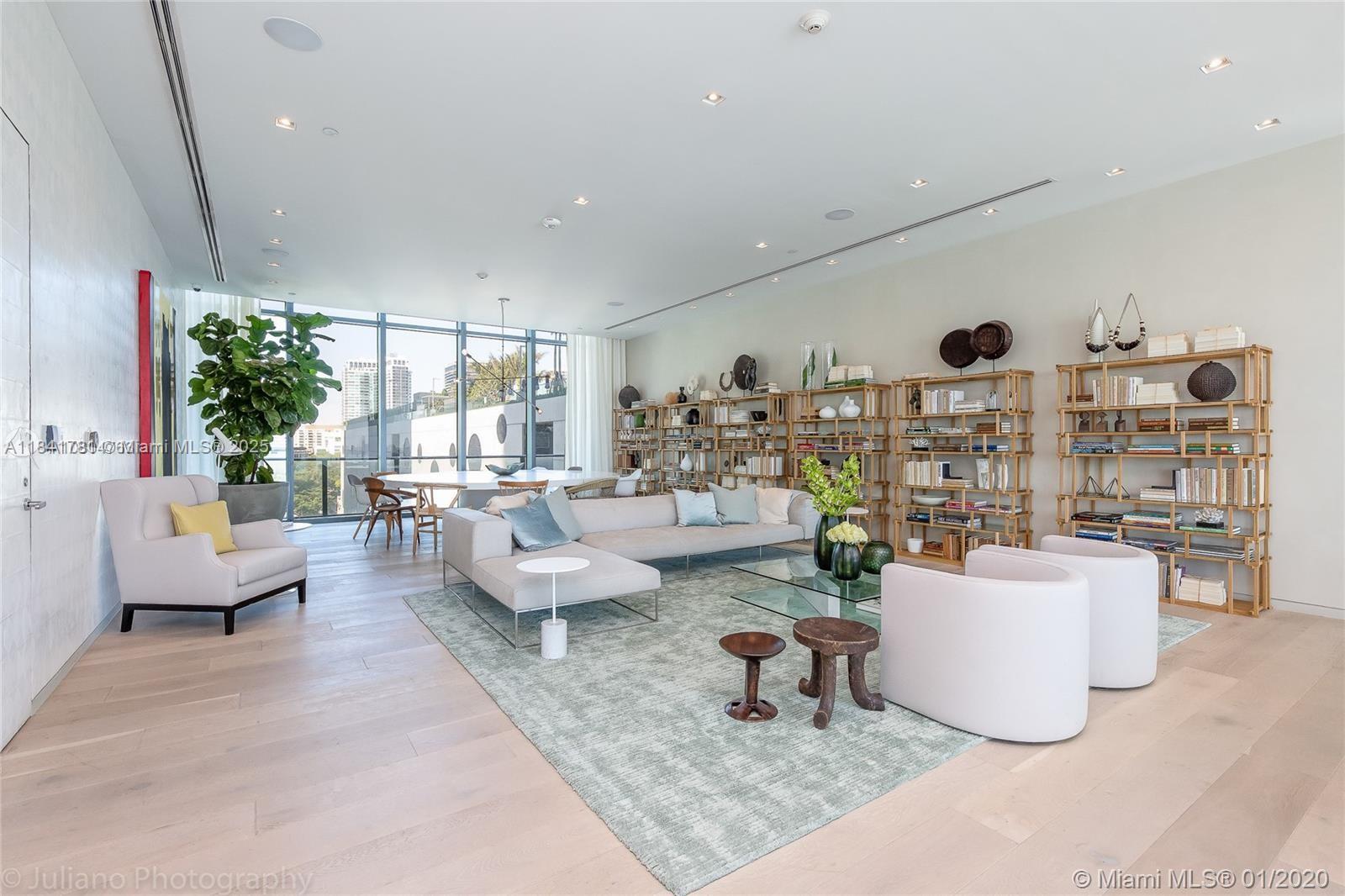 3131 Northeast 7th Avenue, Unit 2801 Miami, FL 33137 - Photo 45 of 47 a living room with furniture and a large window