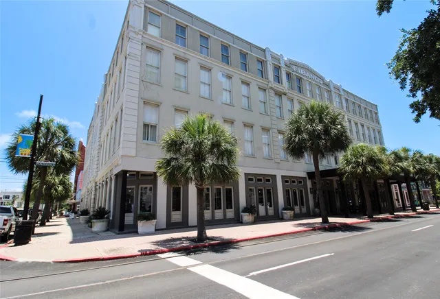 a view of a building along the street