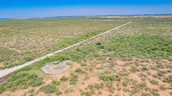 a view of lake with green space