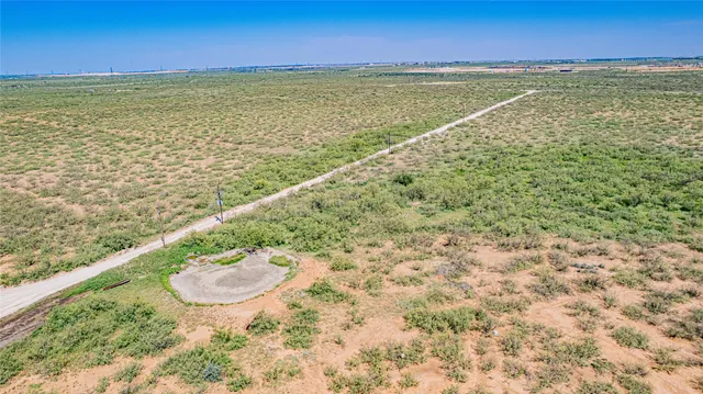 a view of lake with green space