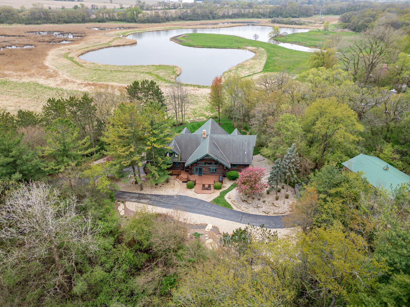 a view of a lake with a yard