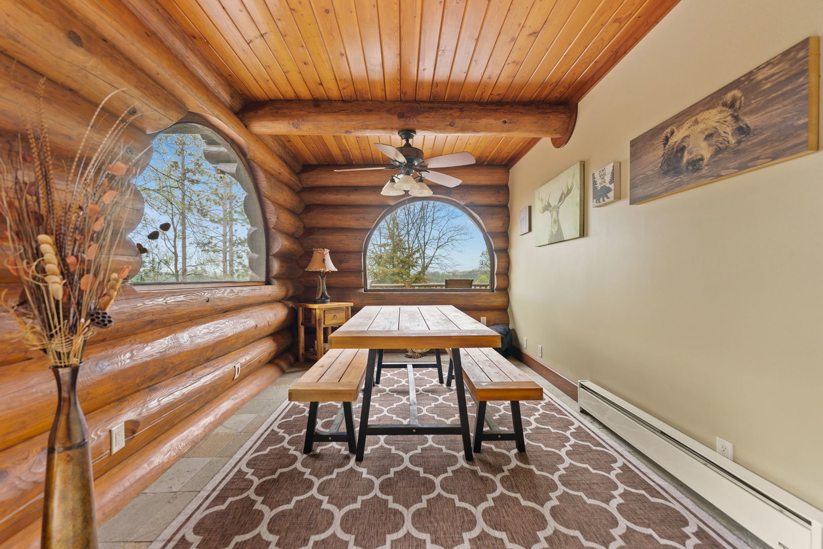 3317 South Country Club Road Woodstock, IL 60098 - Photo 15 of 43 a view of a room with a table and chairs