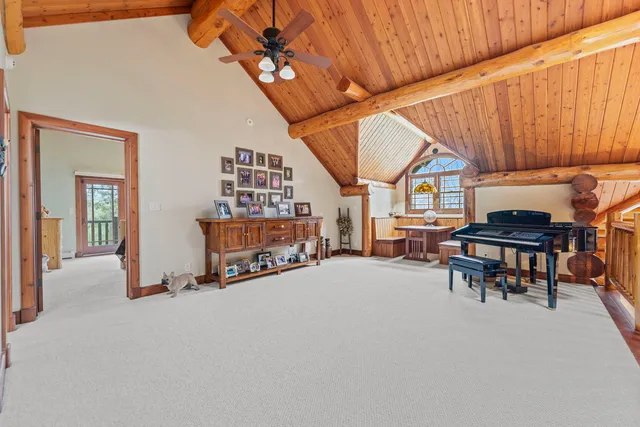 a room with furniture and a chandelier