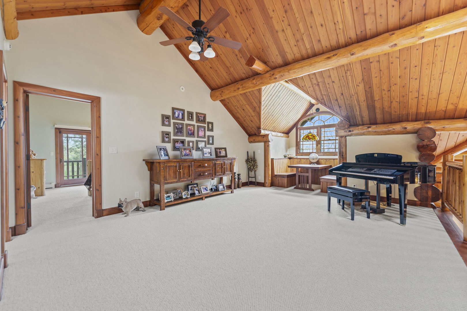 3317 South Country Club Road Woodstock, IL 60098 - Photo 18 of 43 a room with furniture and a chandelier