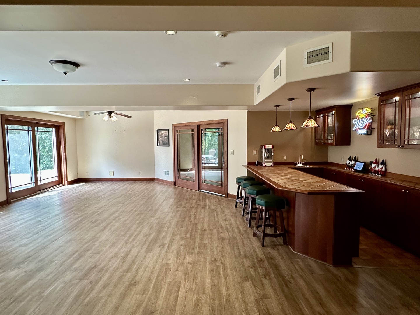 3317 South Country Club Road Woodstock, IL 60098 - Photo 22 of 43 an open kitchen with a sink and breakfast area