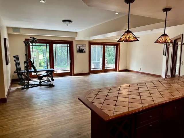 a view of a room with gym equipment
