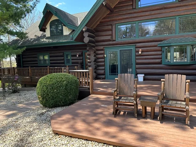 a front view of a house with yard