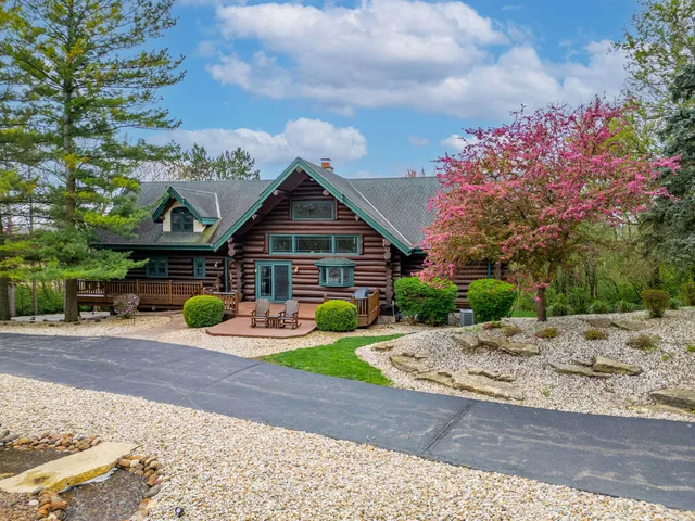 a view of a chairs setting on the deck
