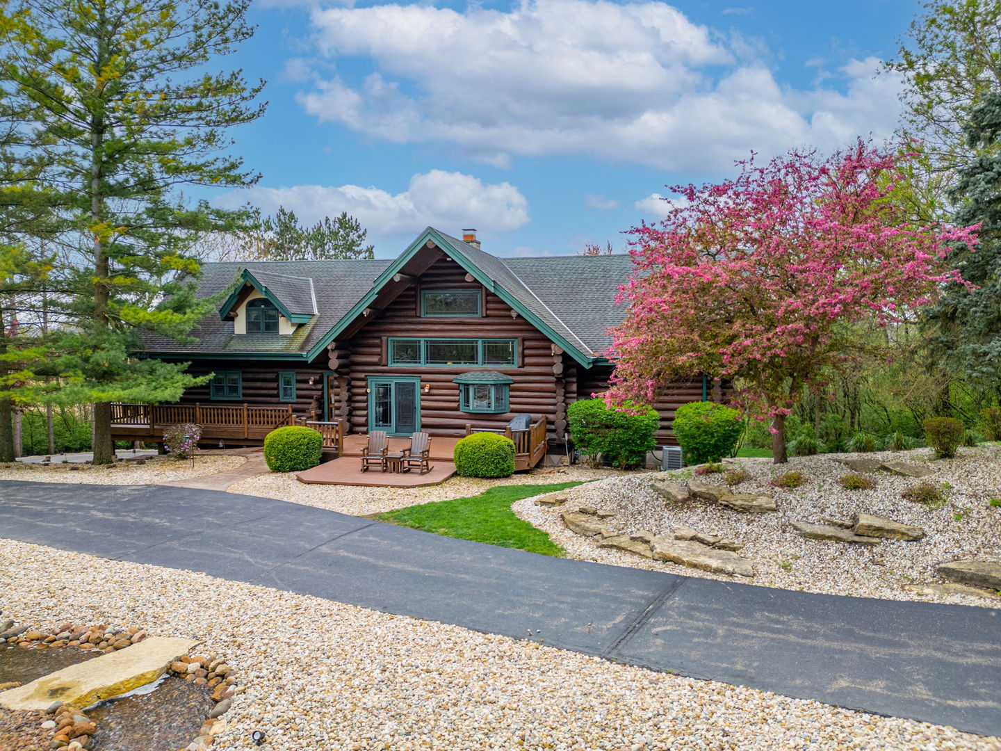 3317 South Country Club Road Woodstock, IL 60098 - Photo 36 of 43 a front view of a house with yard