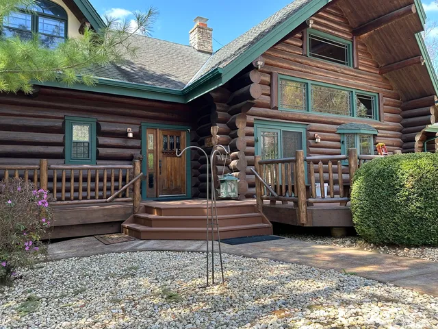 a house with trees in front of it