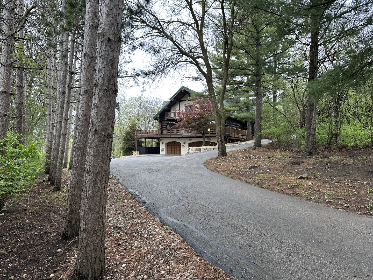 3317 South Country Club Road Woodstock, IL 60098 - Photo 38 of 43 a house with trees in front of it