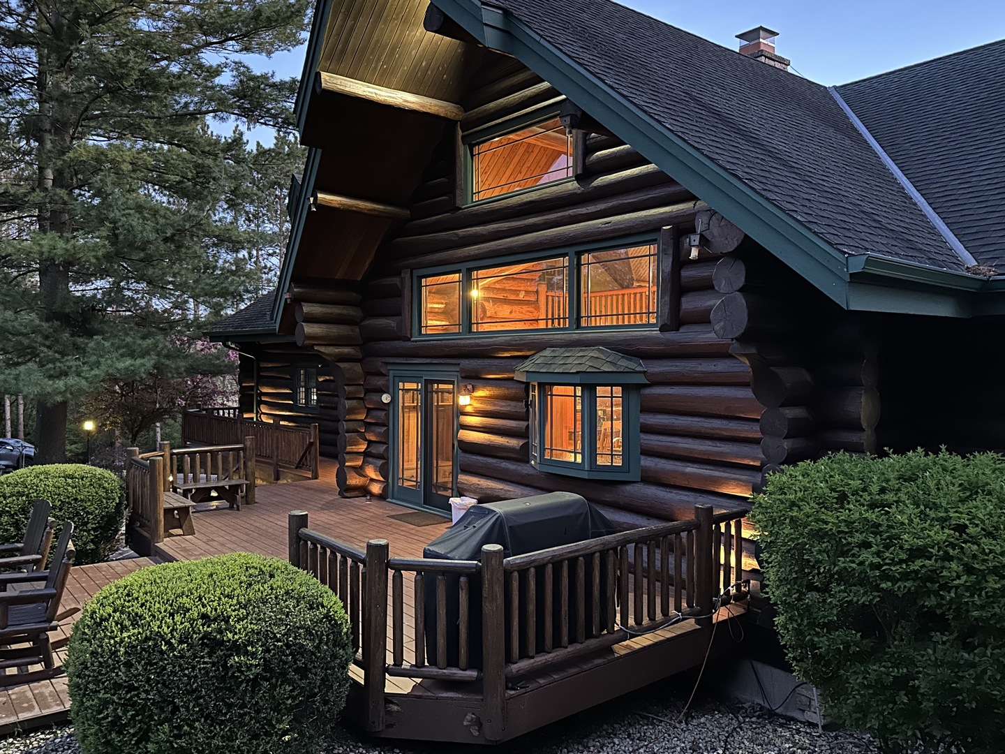 3317 South Country Club Road Woodstock, IL 60098 - Photo 42 of 43 a view of a house with a small deck and furniture