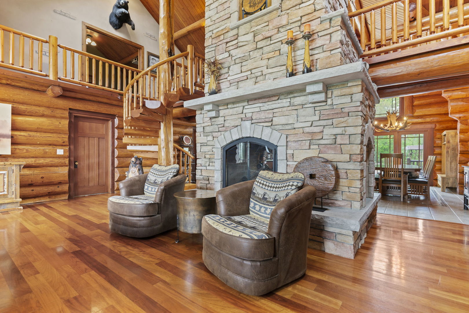 3317 South Country Club Road Woodstock, IL 60098 - Photo 7 of 43 a living room with furniture and a fireplace