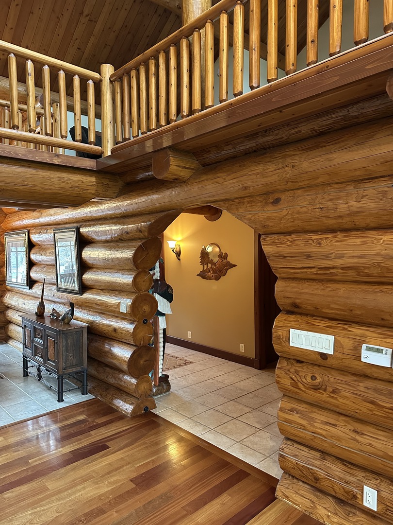 3317 South Country Club Road Woodstock, IL 60098 - Photo 9 of 43 a view of entryway and hall with wooden floor