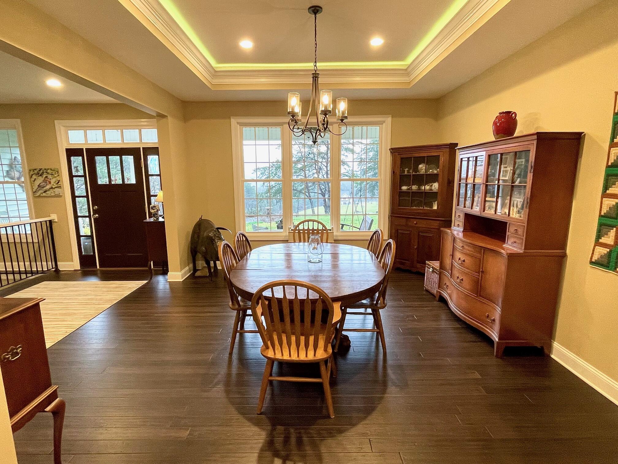 64 Hickory Ridge Court Blue Ridge, VA 24064 - Photo 15 of 61 a view of a dining room with furniture window and wooden floor