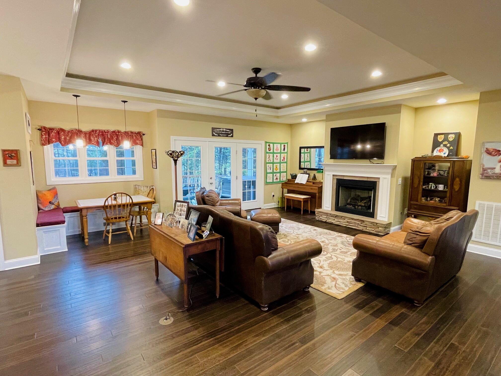 64 Hickory Ridge Court Blue Ridge, VA 24064 - Photo 19 of 61 a living room with furniture flat screen tv and fireplace