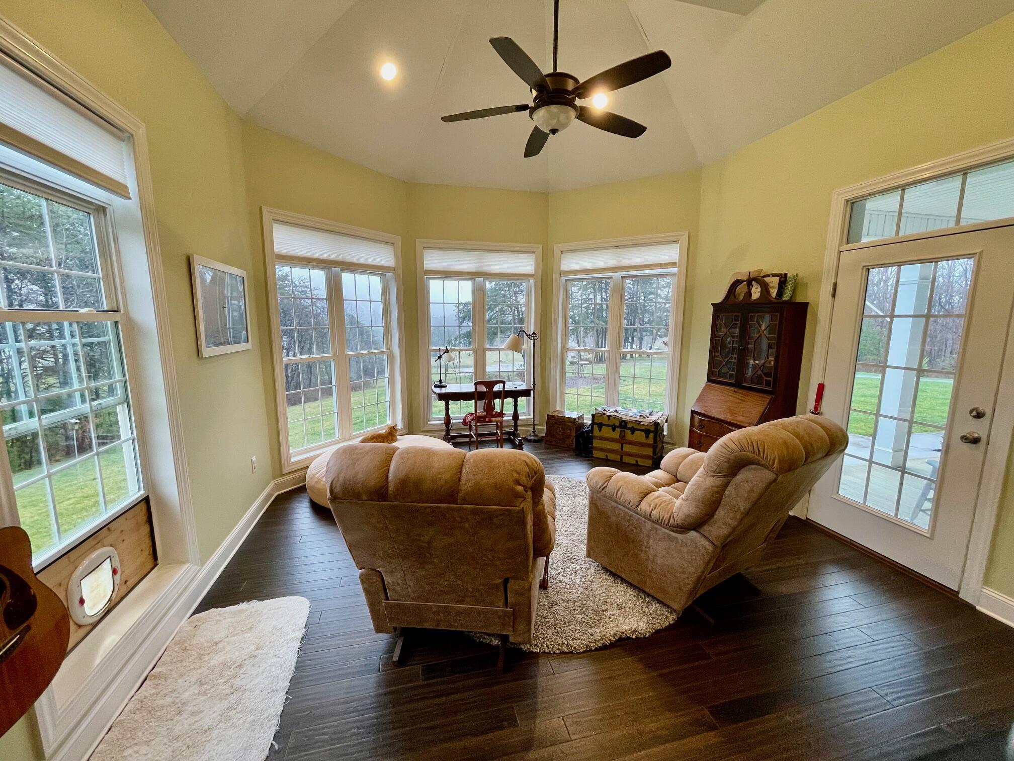 64 Hickory Ridge Court Blue Ridge, VA 24064 - Photo 34 of 61 a living room with furniture wooden floor and a window