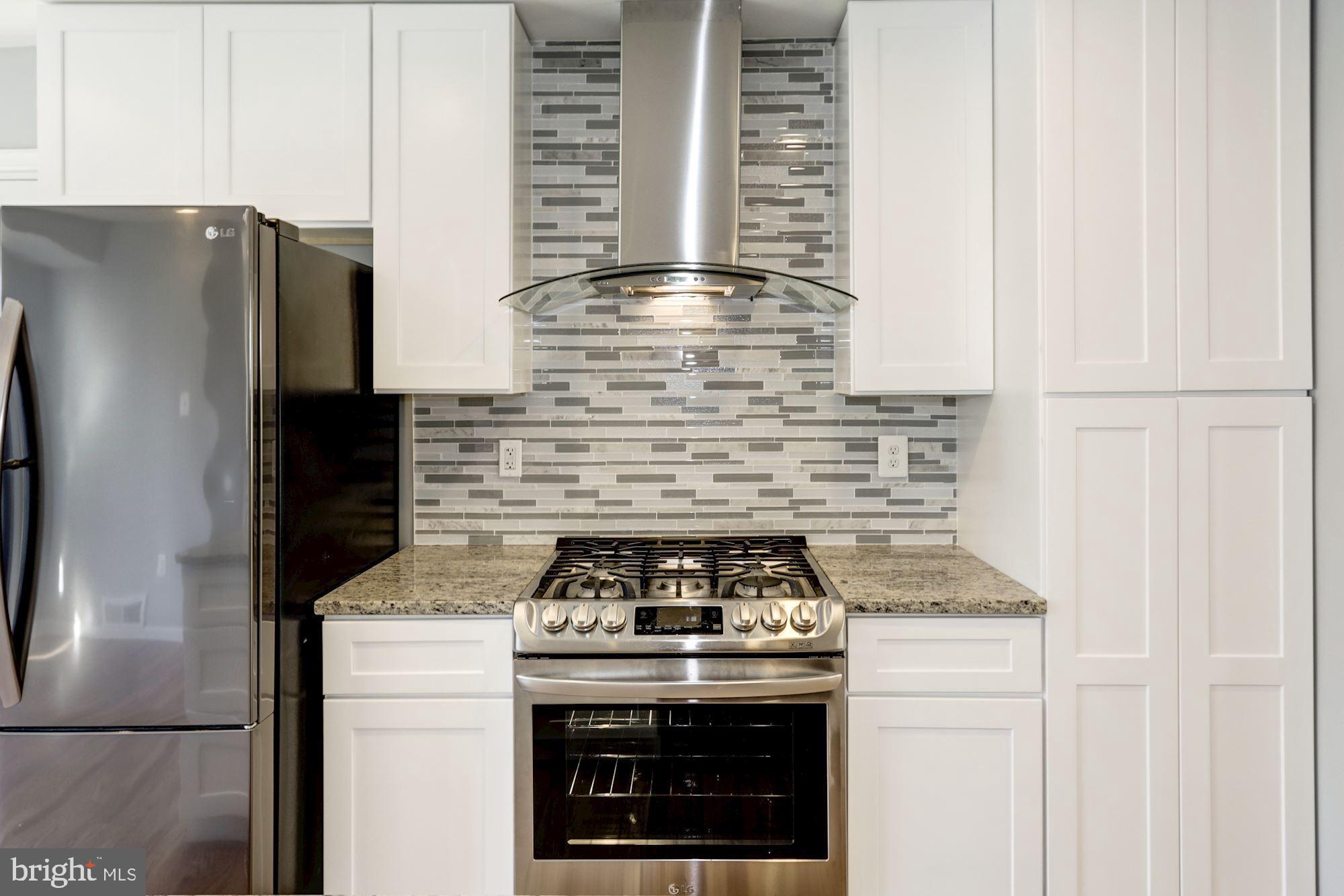 9807 Cherry Tree Lane Silver Spring, MD 20901 - Photo 9 of 46 5 Burner Stove with Vent Hood