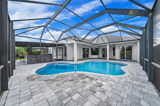 a view of a backyard of a house