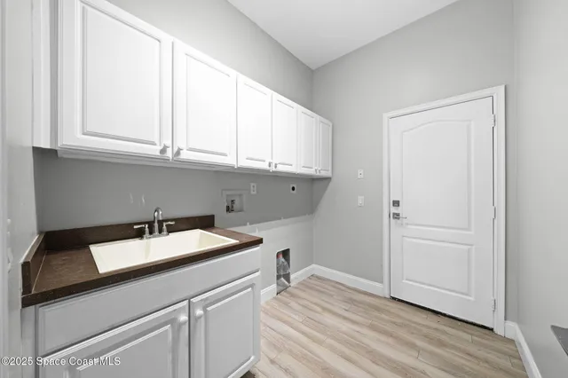 a bathroom with a toilet sink a shower and