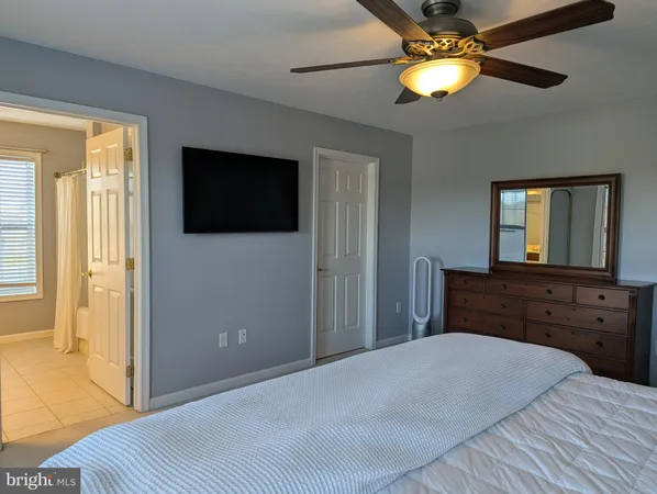 a view of an empty room with wooden door