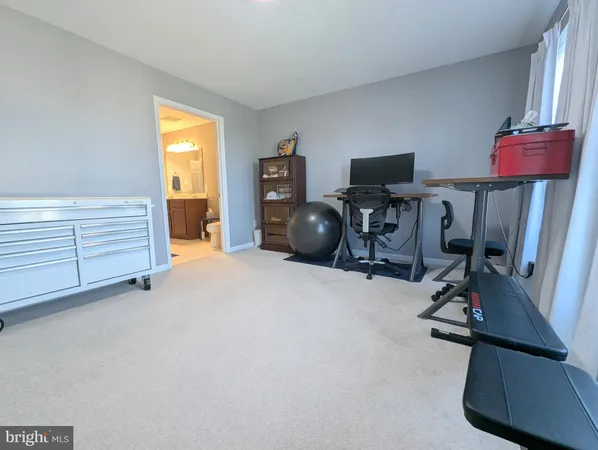 a view of a storage & utility room with racks on the wall