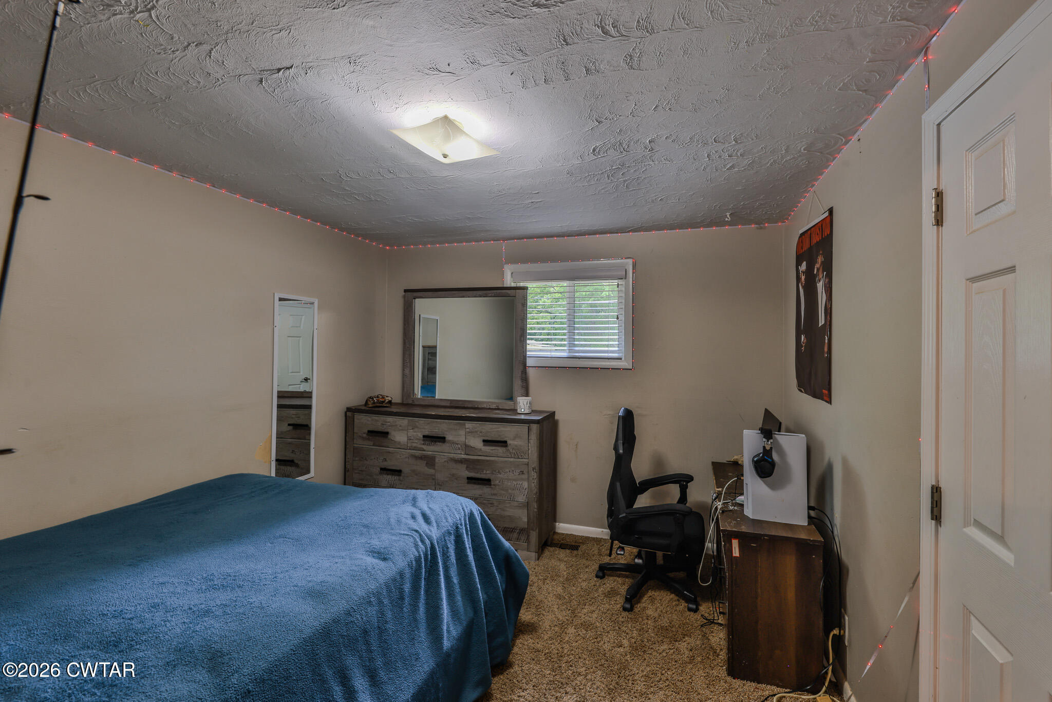 25 Shady Lane Huntingdon, TN 38344 - Photo 10 of 16 a bedroom with a bed and furniture