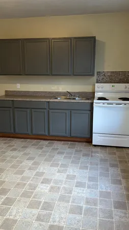 a kitchen with a cabinets